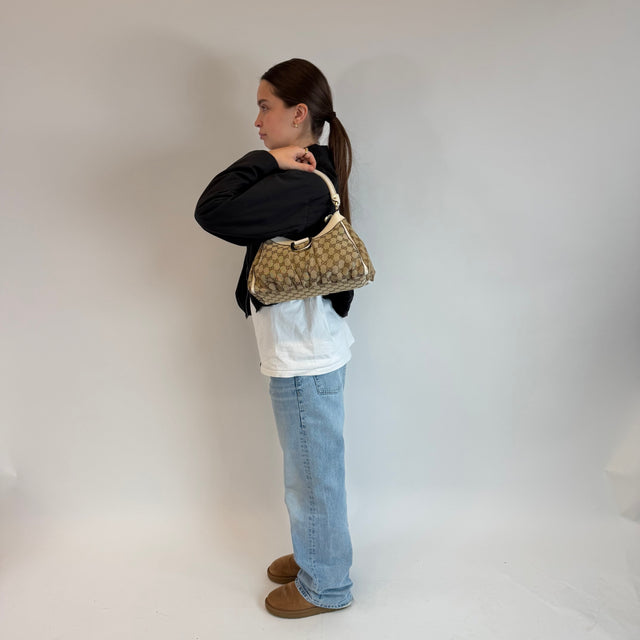 Borsa a tracolla con anello a D media