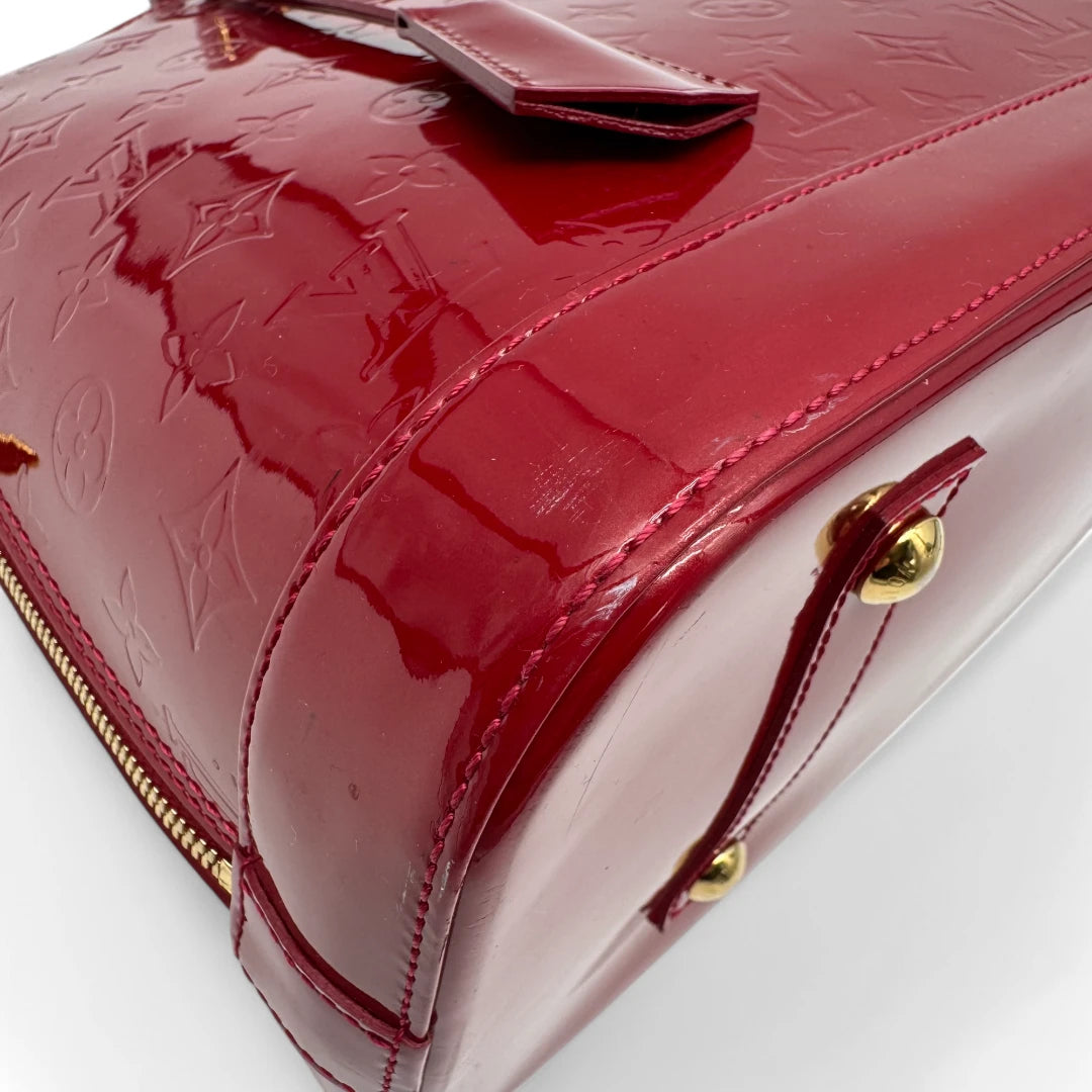Louis Vuitton handbag Alma GM Vernis red