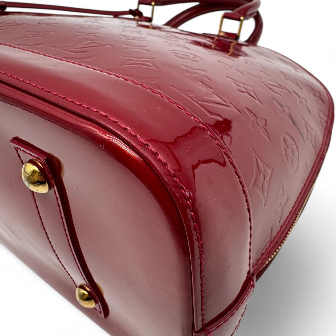 Louis Vuitton handbag Alma GM Vernis red
