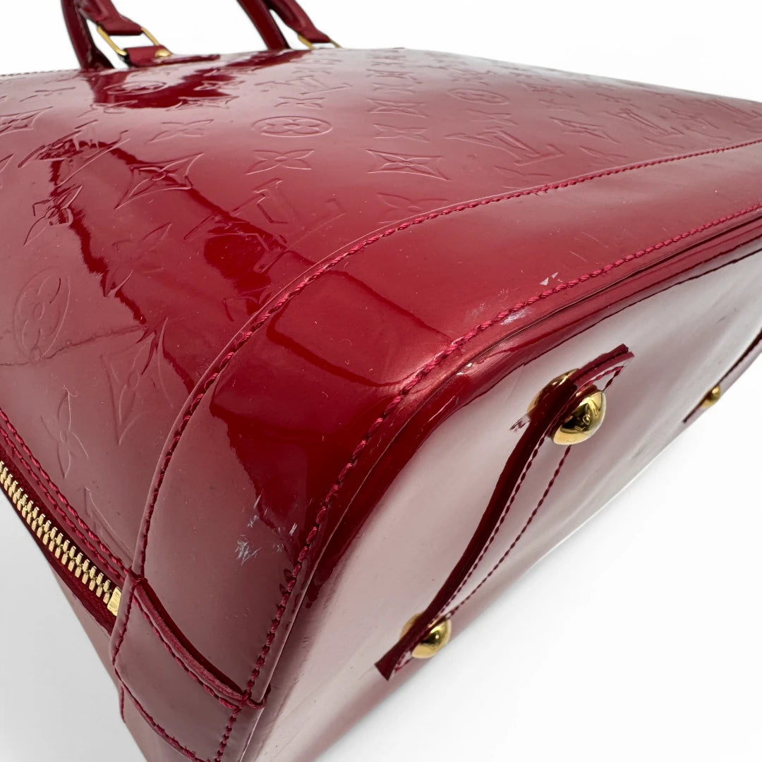 Louis Vuitton handbag Alma GM Vernis red