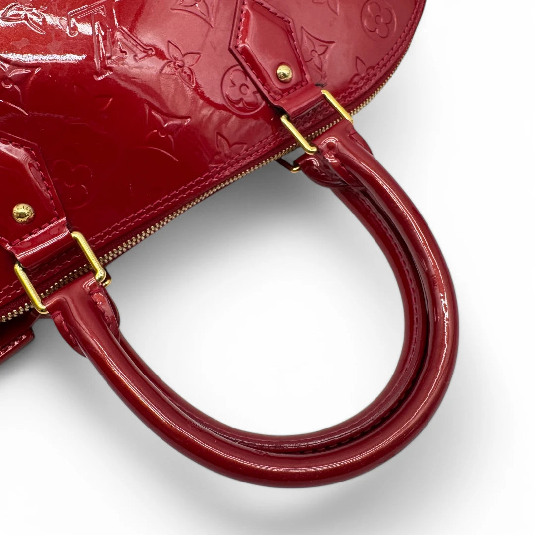 Louis Vuitton handbag Alma GM Vernis red