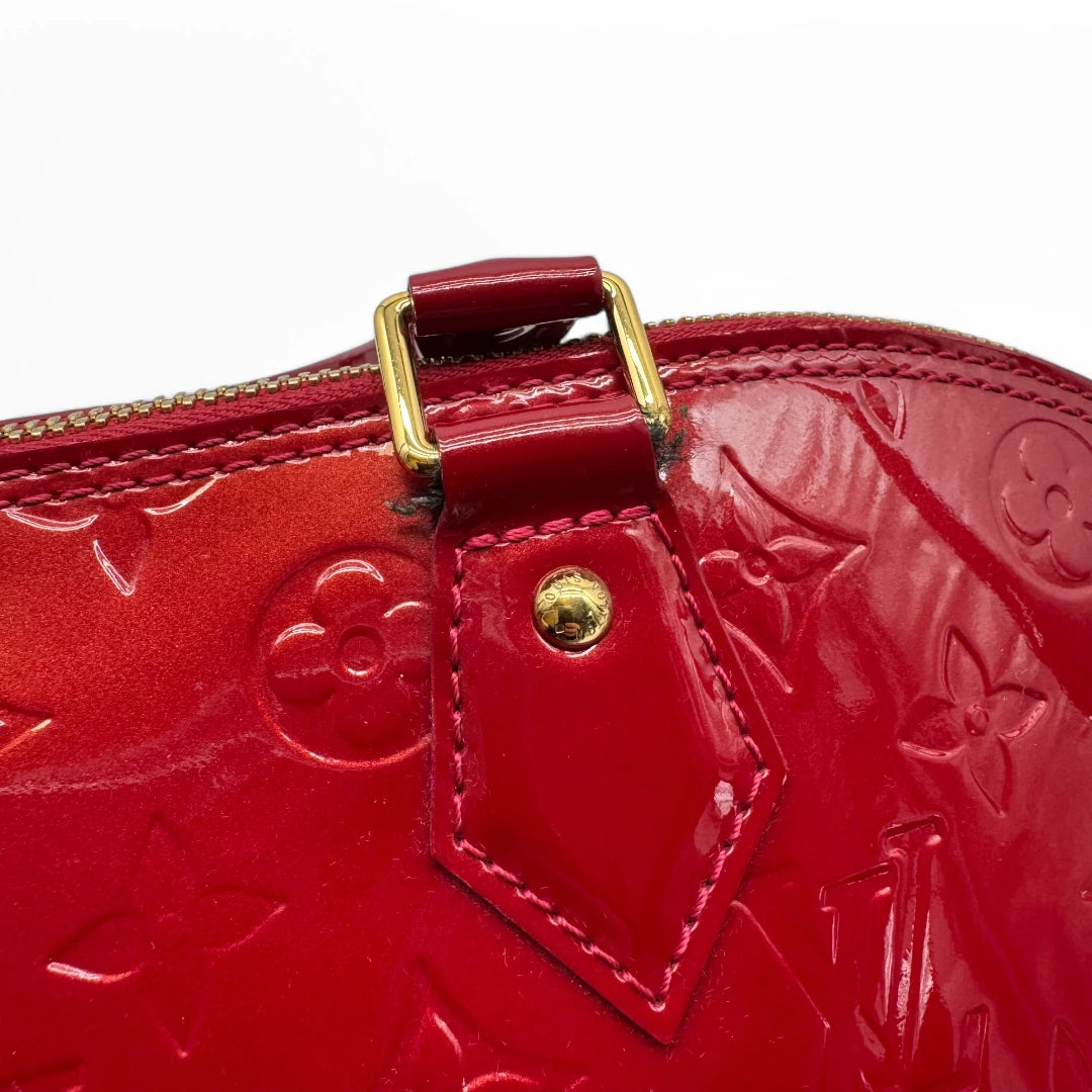 Louis Vuitton handbag Alma GM Vernis red