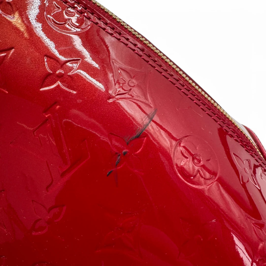 Louis Vuitton handbag Alma GM Vernis red