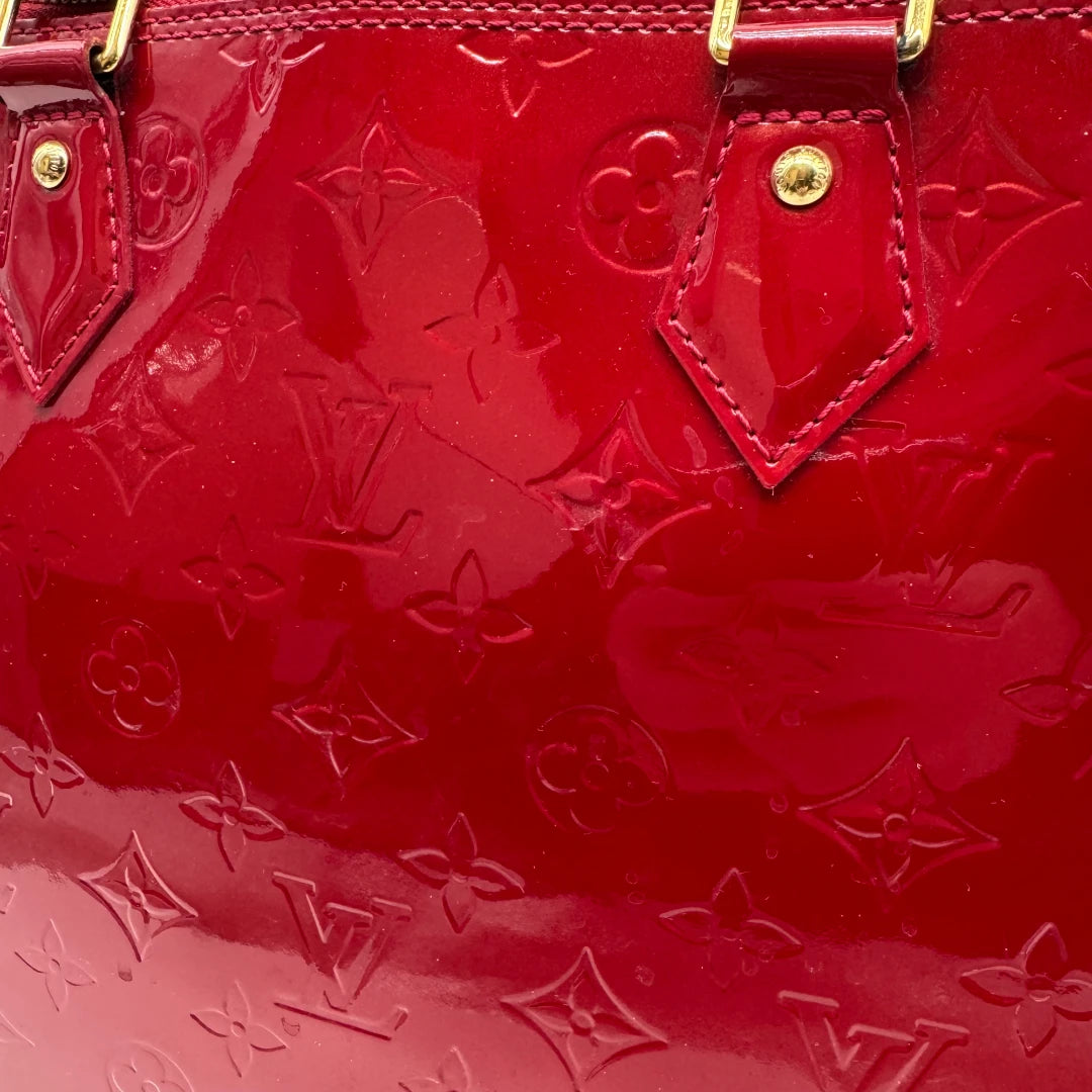 Louis Vuitton handbag Alma GM Vernis red