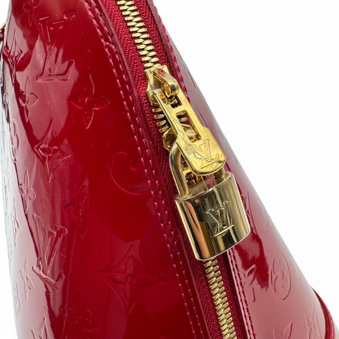 Louis Vuitton handbag Alma GM Vernis red