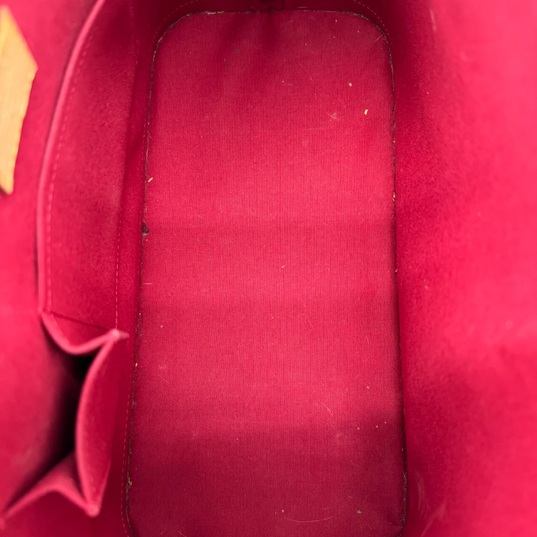 Louis Vuitton handbag Alma GM Vernis red