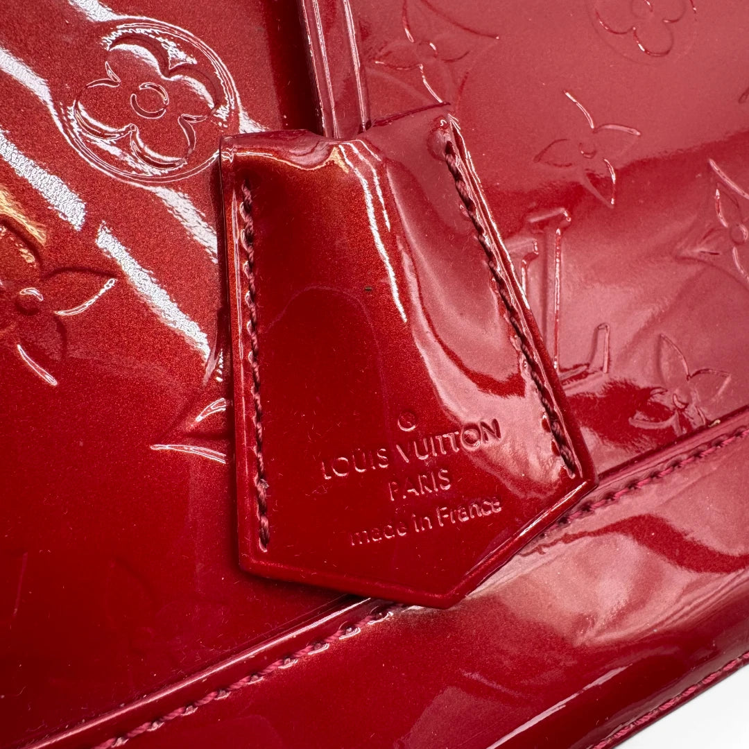 Louis Vuitton handbag Alma GM Vernis red
