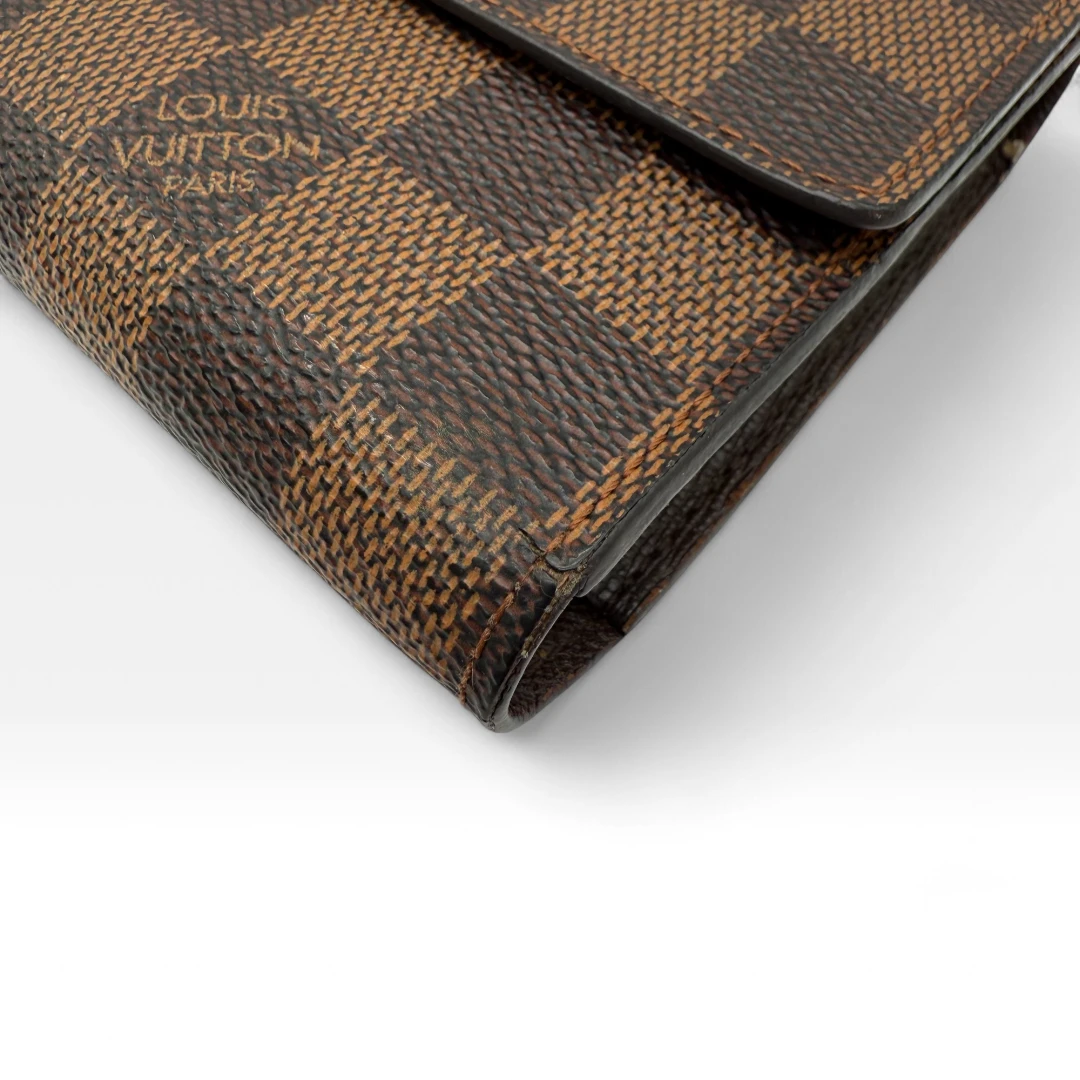 Louis Vuitton Geldbeutel Porte-Tresor International Damier Ebene braun