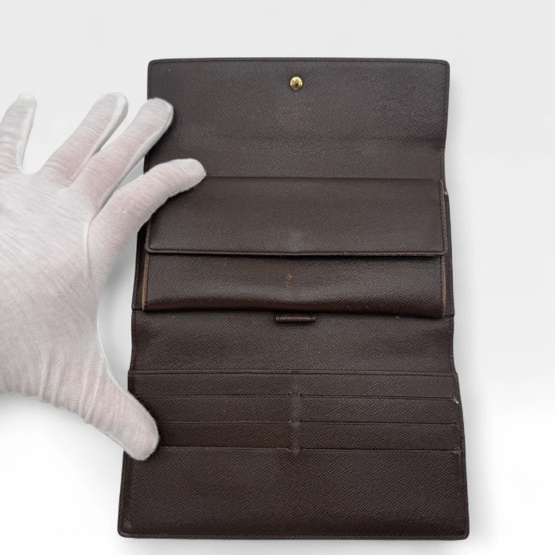 Louis Vuitton Geldbeutel Porte-Tresor International Damier Ebene braun