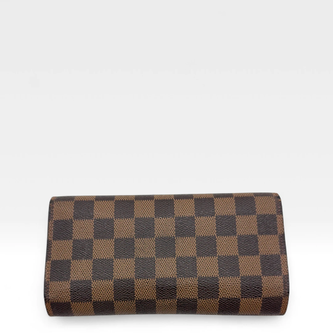 Louis Vuitton Geldbeutel Porte-Tresor International Damier Ebene braun