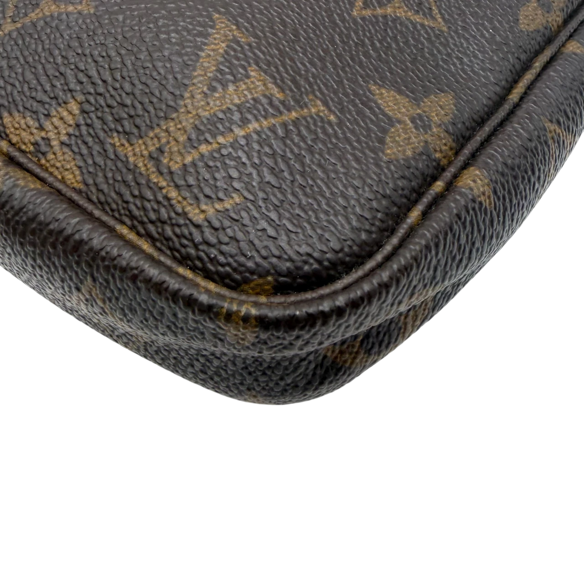 Louis Vuitton Pochette Accessoires monogram braun – Ecken im Detail
