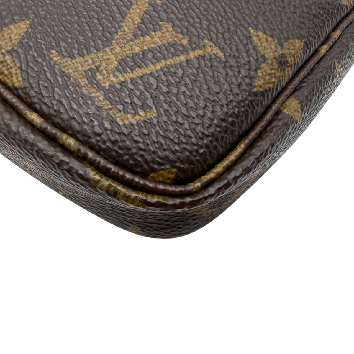 Louis Vuitton Pochette Accessoires monogram braun – Ecken im Detail