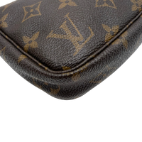 Louis Vuitton Pochette Accessoires monogram braun – Ecken im Detail