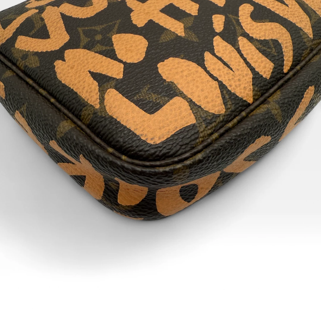 Louis Vuitton Pochette Accessoires Graffiti orange monogram braun