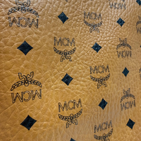 MCM Clutch visetos braun – Logo im Detail