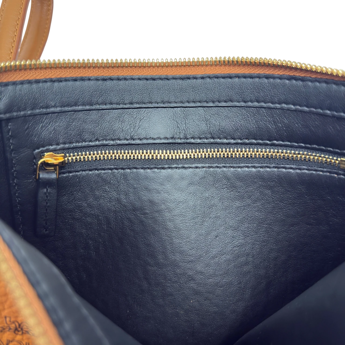 MCM Clutch visetos braun – Innentasche