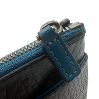 MCM Clutch visetos schwarz – Beschläge im Detail