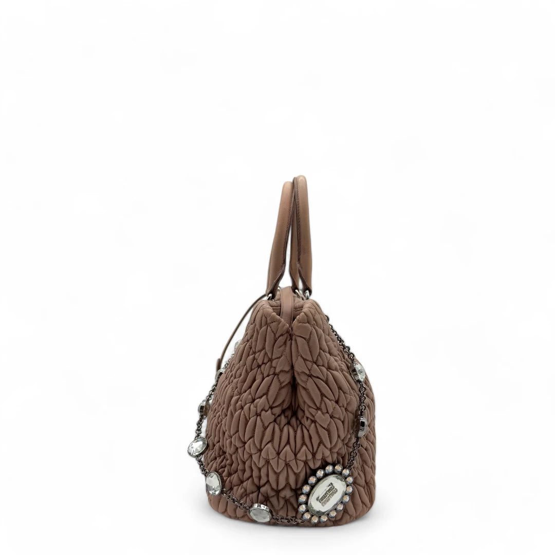 Miu Miu handbag Matelassé with shoulder strap and Miu Miu charm in pink leather