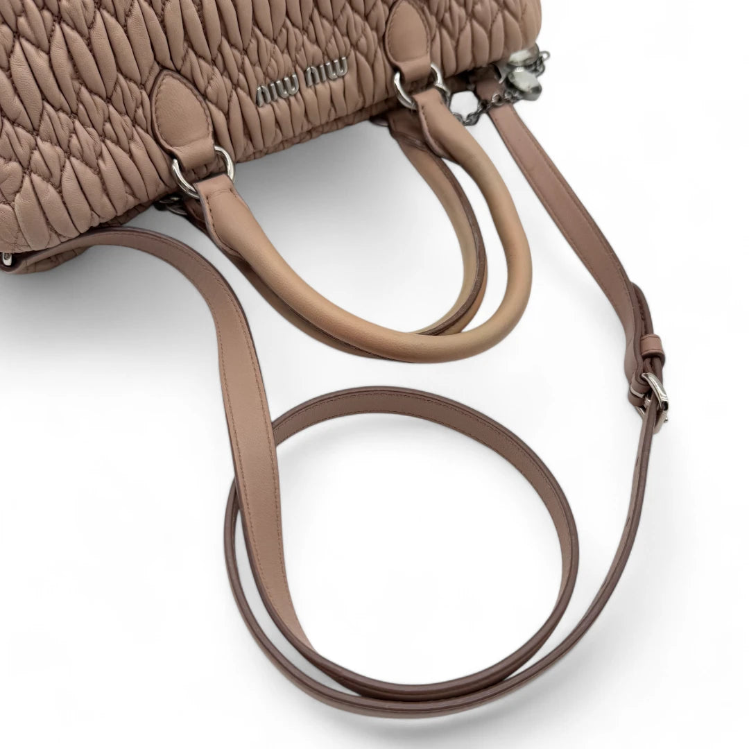 Miu Miu handbag Matelassé with shoulder strap and Miu Miu charm in pink leather