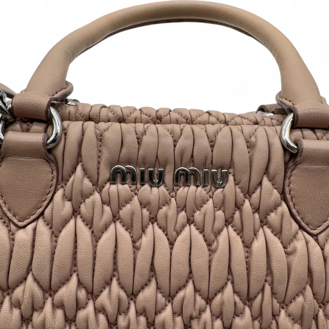 Miu Miu handbag Matelassé with shoulder strap and Miu Miu charm in pink leather