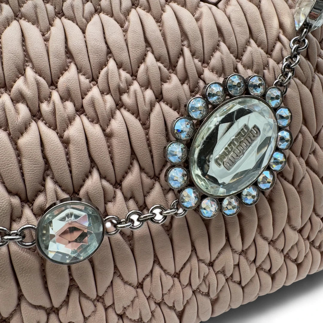 Miu Miu handbag Matelassé with shoulder strap and Miu Miu charm in pink leather