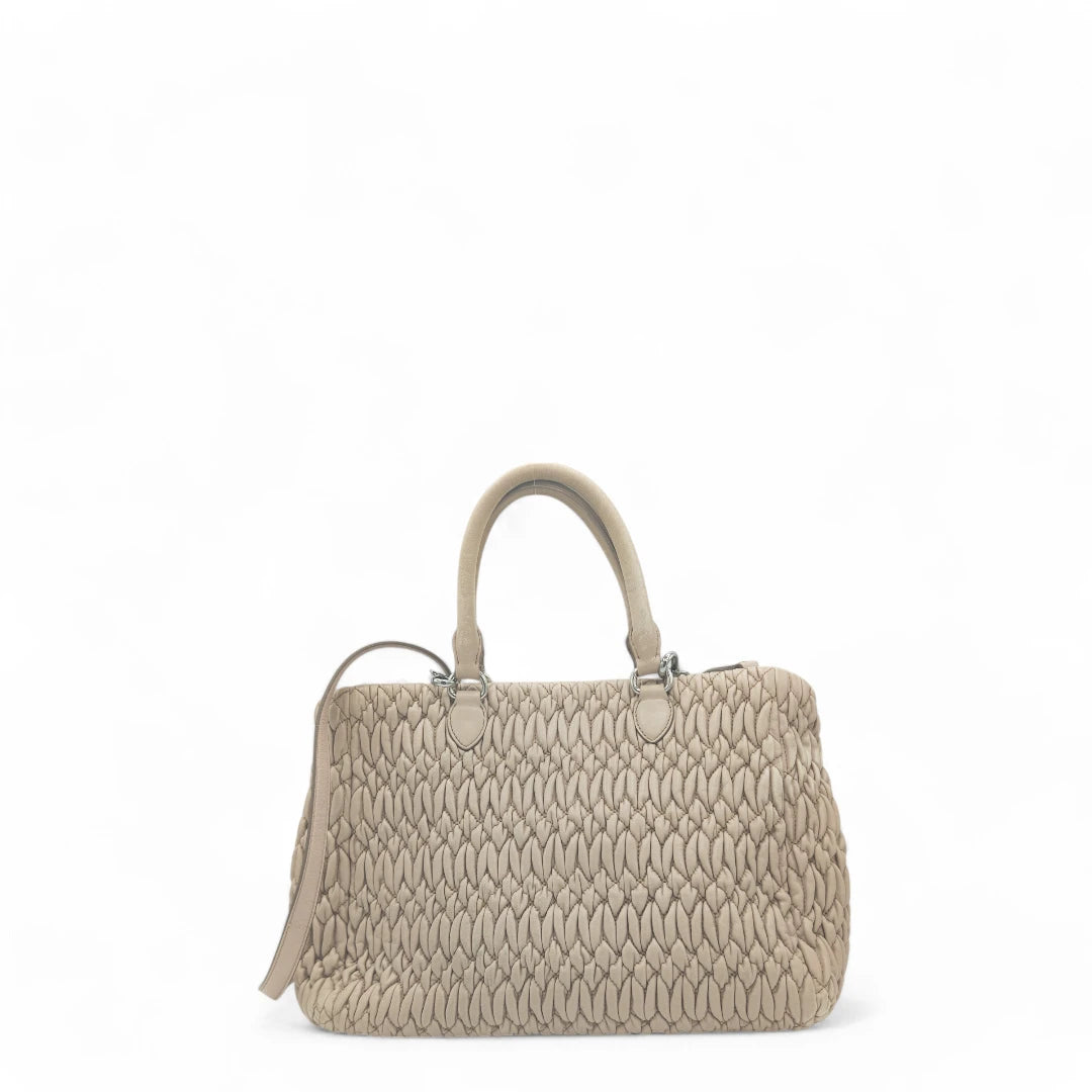 Miu Miu handbag Matelassé with shoulder strap and Miu Miu charm in pink leather