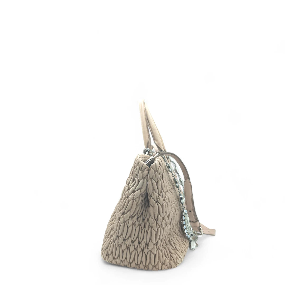 Miu Miu handbag Matelassé with shoulder strap and Miu Miu charm in pink leather