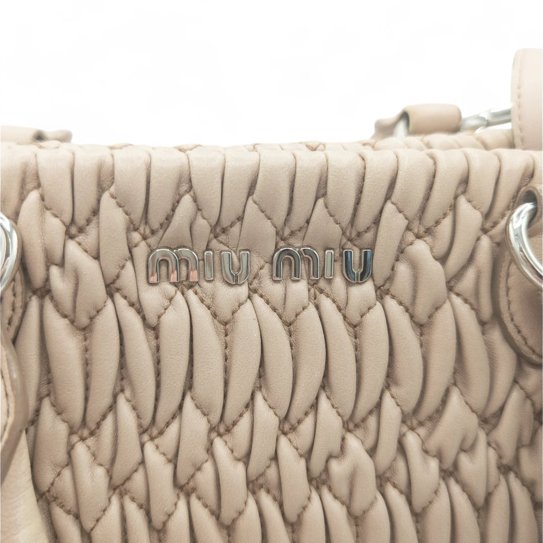 Miu Miu handbag Matelassé with shoulder strap and Miu Miu charm in pink leather