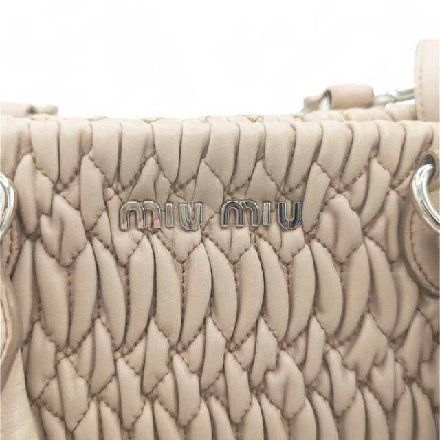 Miu Miu handbag Matelassé with shoulder strap and Miu Miu charm in pink leather