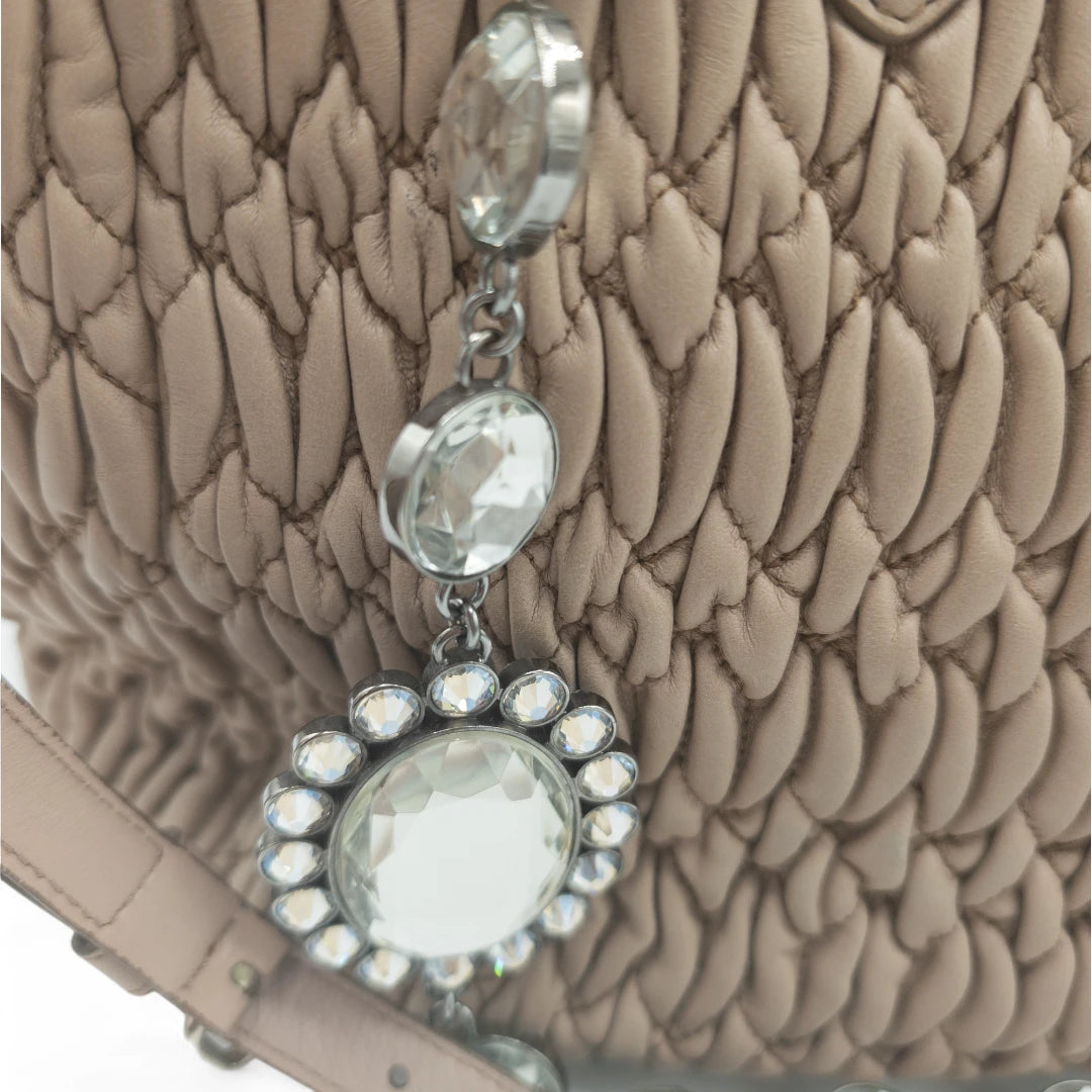 Miu Miu handbag Matelassé with shoulder strap and Miu Miu charm in pink leather