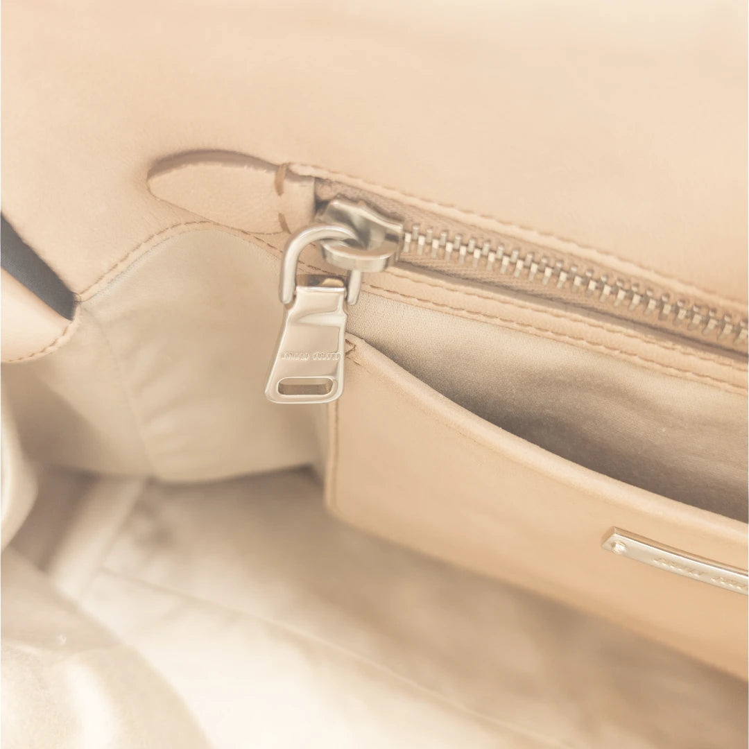 Miu Miu handbag Matelassé with shoulder strap and Miu Miu charm in pink leather