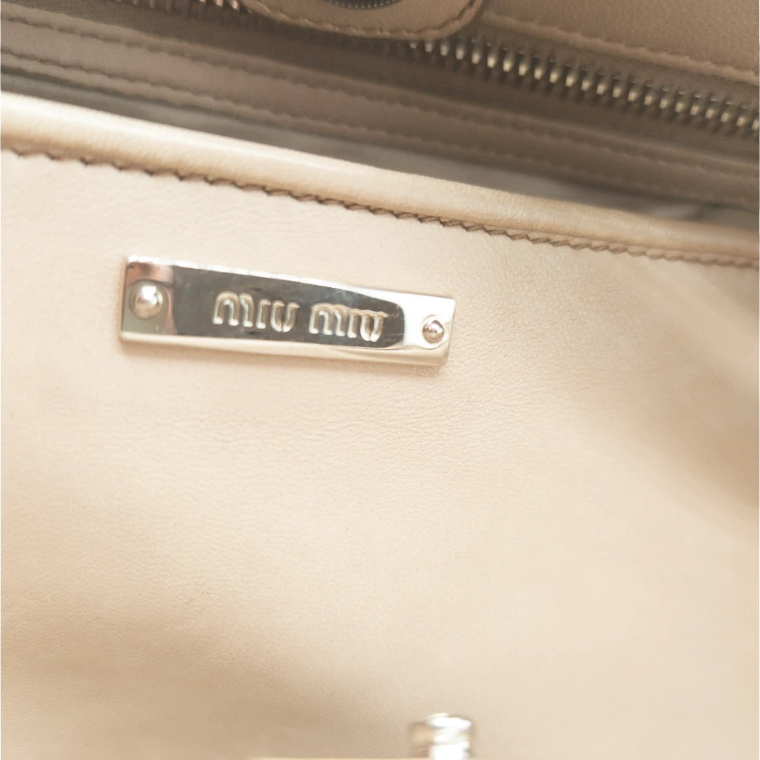 Miu Miu handbag Matelassé with shoulder strap and Miu Miu charm in pink leather