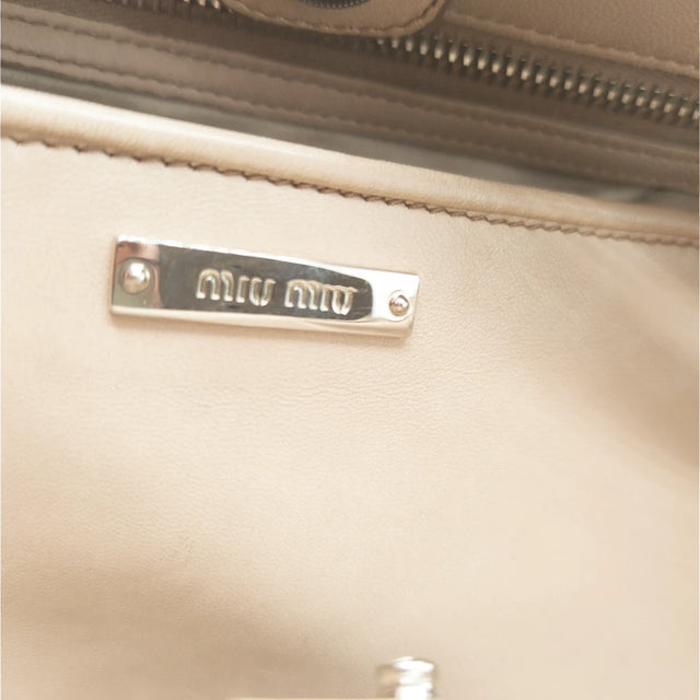 Miu Miu handbag Matelassé with shoulder strap and Miu Miu charm in pink leather