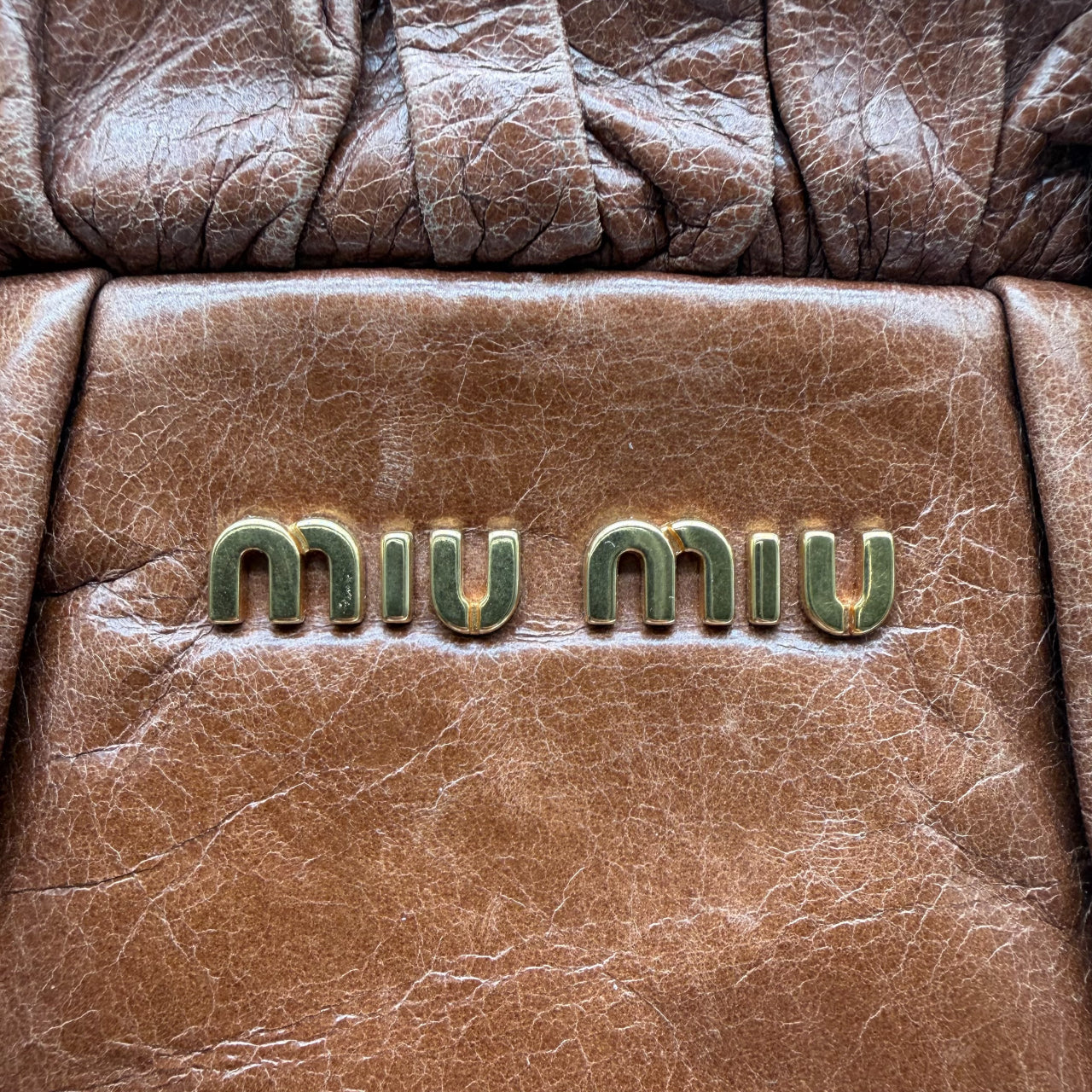 Miu Miu handbag Vitello Lux with shoulder strap made of dark brown leather