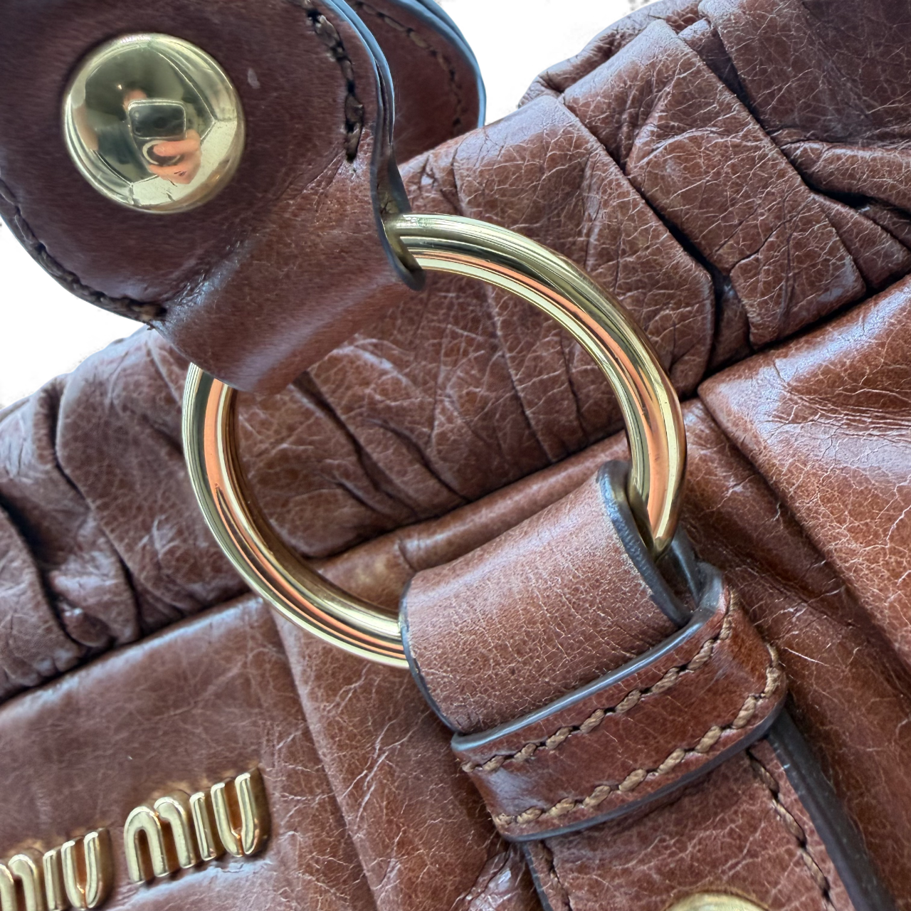 Miu Miu handbag Vitello Lux with shoulder strap made of dark brown leather