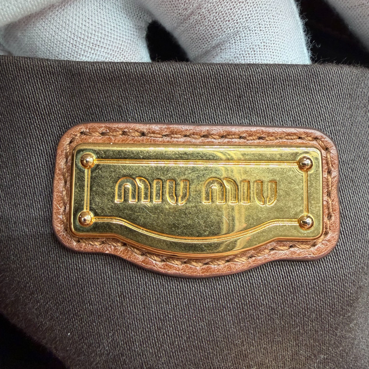 Miu Miu handbag Vitello Lux with shoulder strap made of dark brown leather