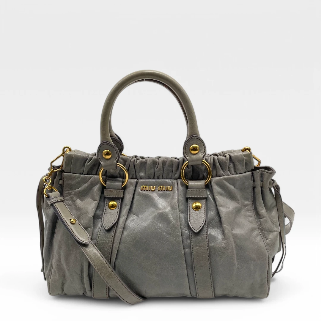 Miu Miu handbag Vitello Lux with shoulder strap in grey leather