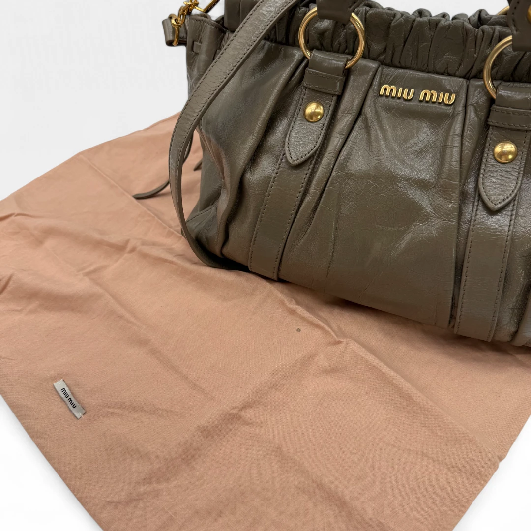 Miu Miu handbag Vitello Lux with shoulder strap in grey leather