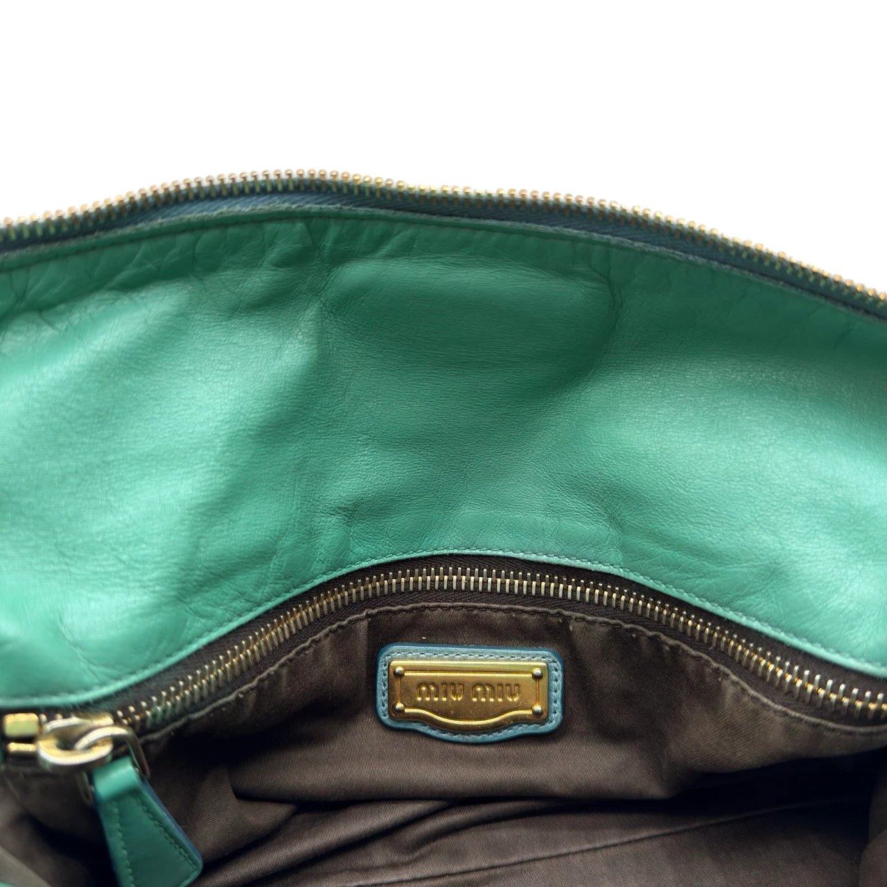 Miu Miu Handtasche Vitello Satchel aus Leder grün