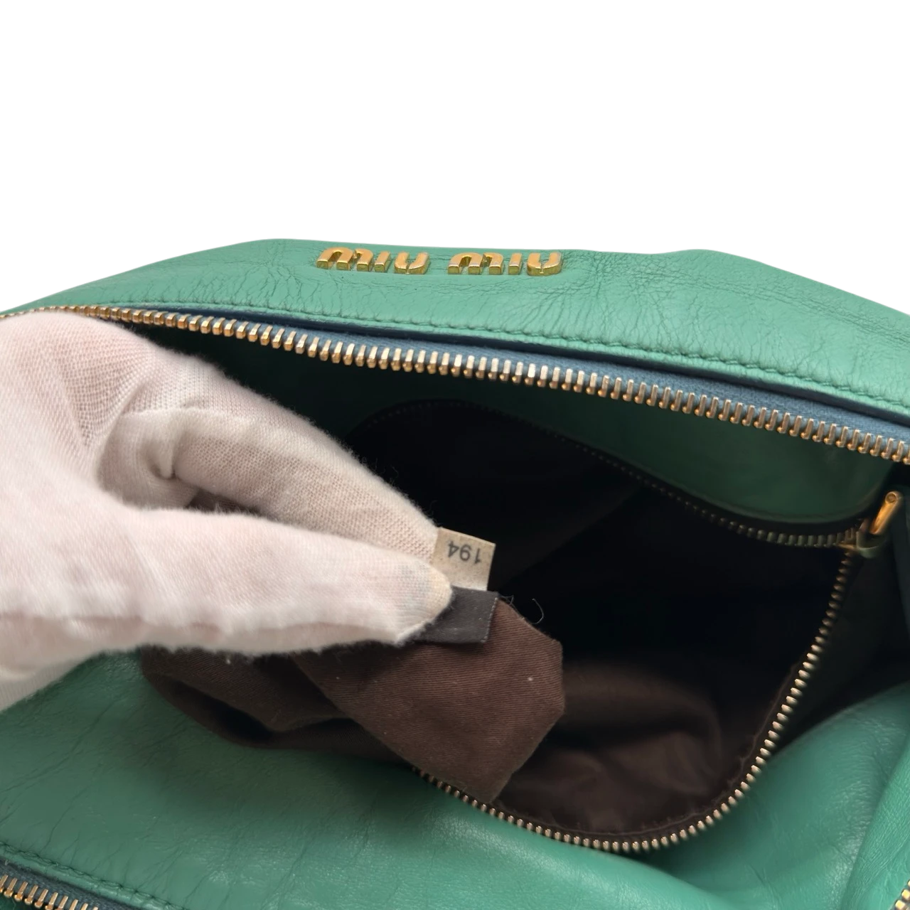 Miu Miu Handtasche Vitello Satchel aus Leder grün