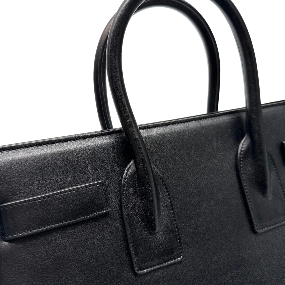 Saint Laurent Handtasche Sac de Jour medium aus Leder schwarz – Henkel im Detail