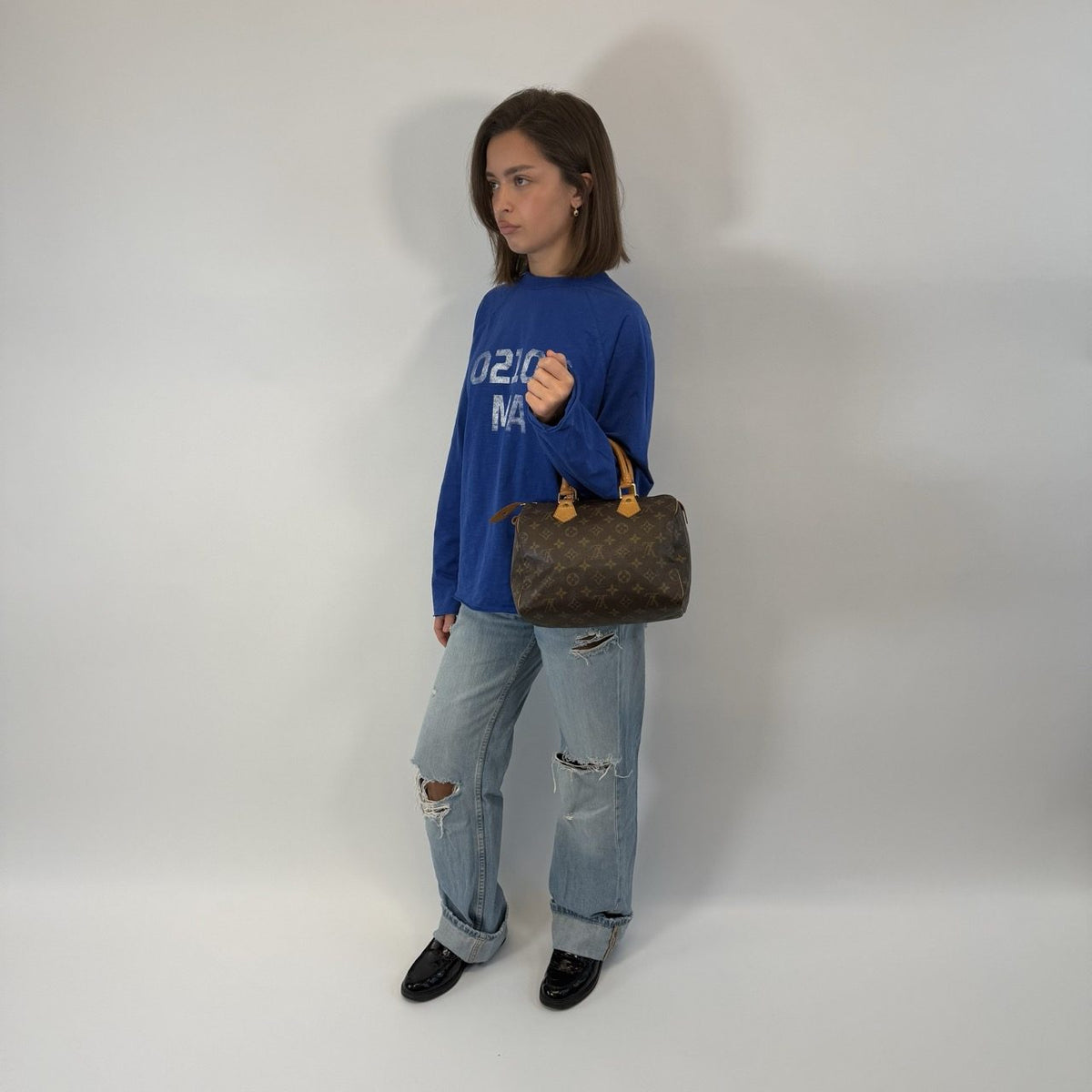 Louis Vuitton Handtasche Speedy 25 monogram braun – getragen am Model