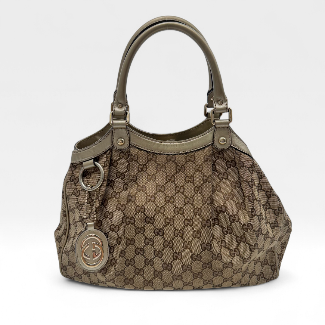 Gucci Handtasche Sukey goldene Lederdetails monogram beige